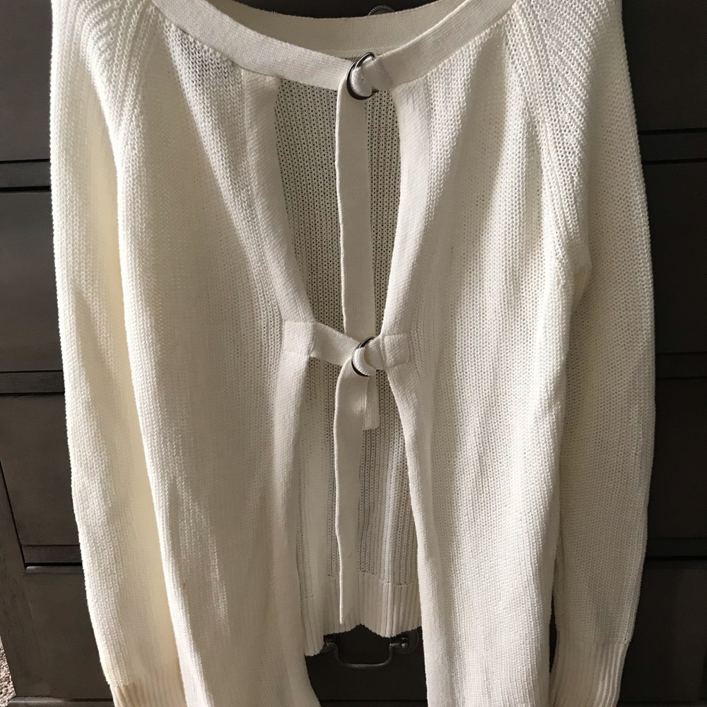 White sweater with open back